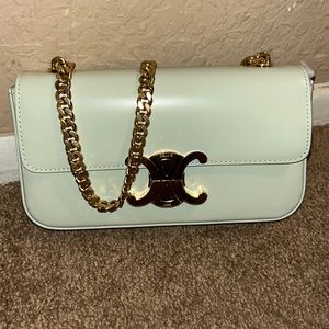 NEW CHAIN SHOULDER BAG TRIOMPHE IN SHINY CALFSKIN
JADE